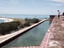 Moat surrounding Fort Jefferson: Marco Polo in background.